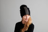 Reversible Slouchy Black Cashmere Hat with Light Caramel Pom-Pom